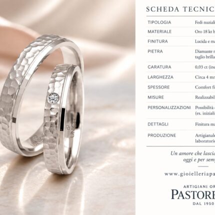 Fedi martellate in oro bianco con diamante